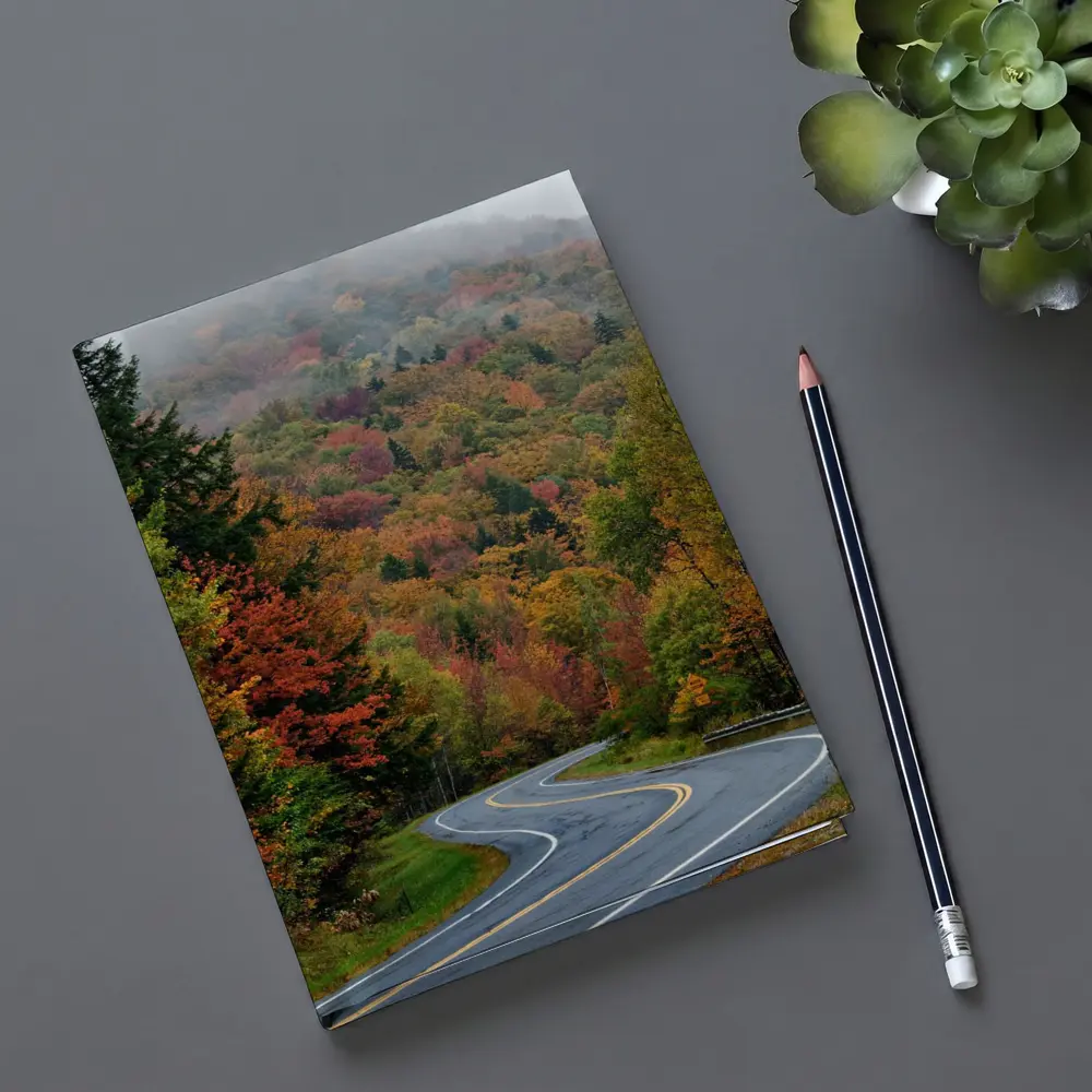 Winding Autumn Road Through Foggy Forest – Notebooks