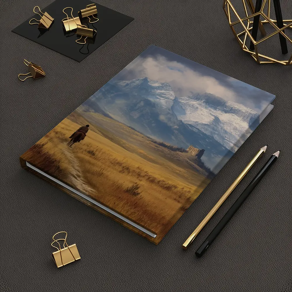 Lone Cowboy Riding Toward Snow Capped Mountains – Notebooks