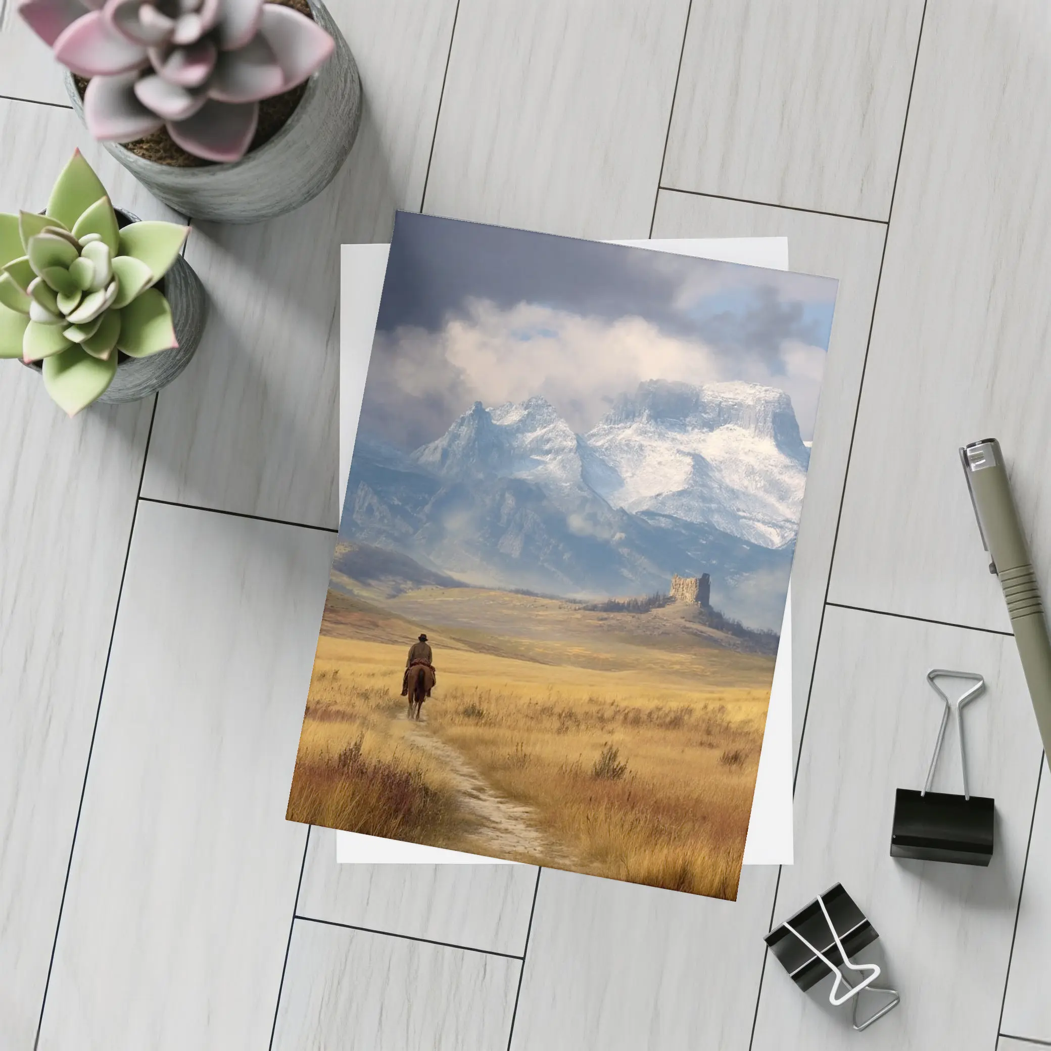 Lone Cowboy Riding Toward Snow Capped Mountains – Postcards