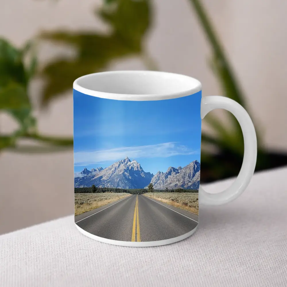 Open Road Leading to Grand Teton Mountains – Mugs