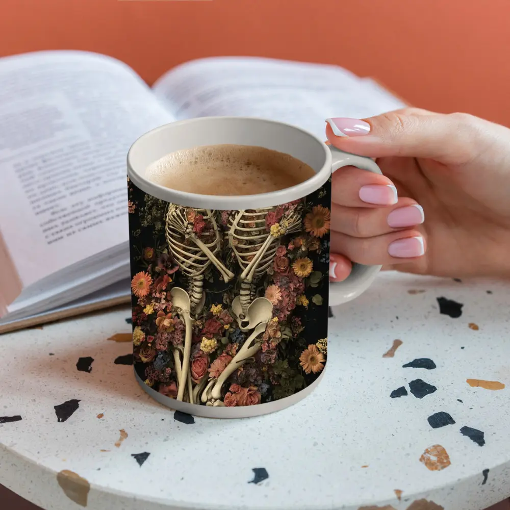 Two Skeletons Embracing Among Colorful Flowers – Mugs