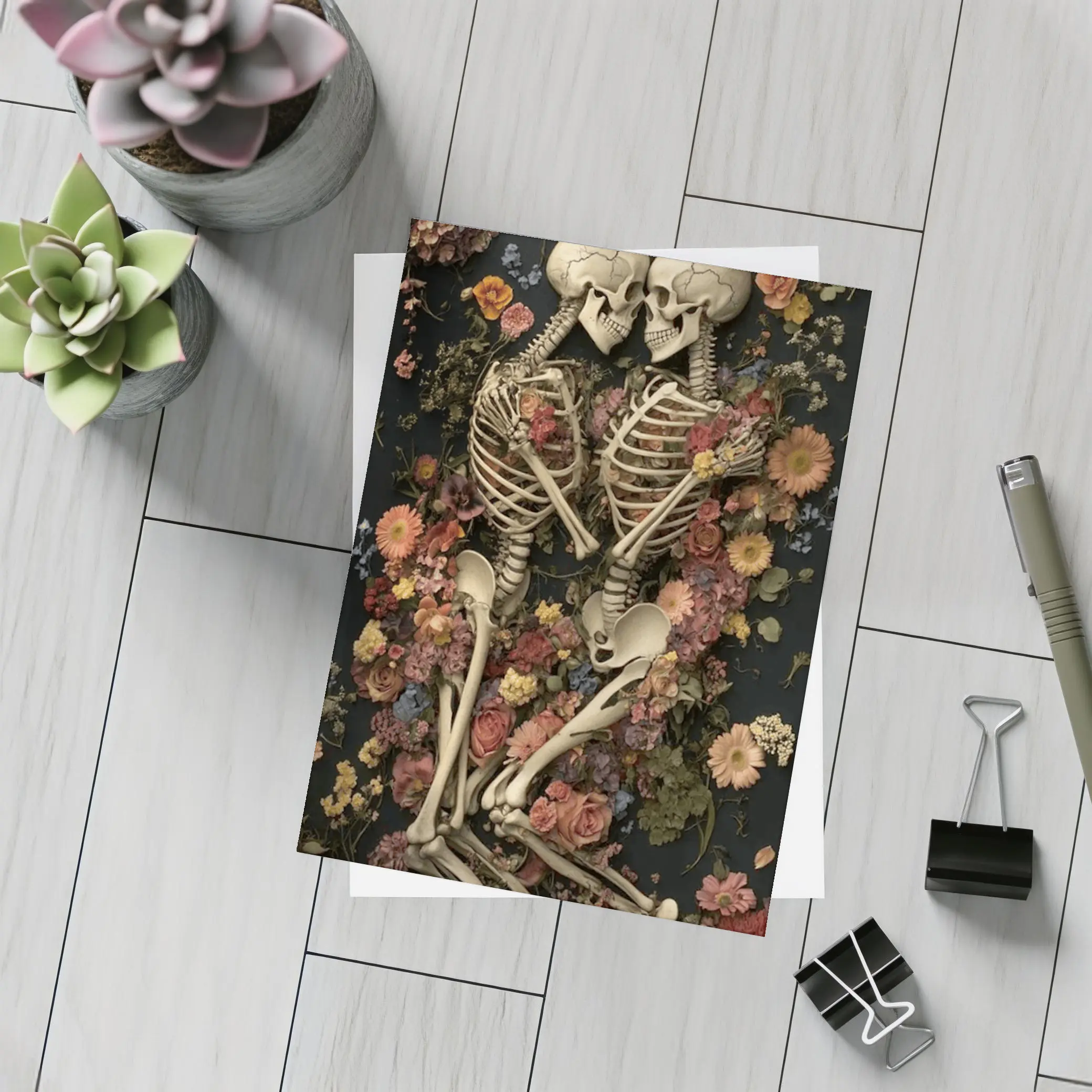 Two Skeletons Embracing Among Colorful Flowers – Postcards