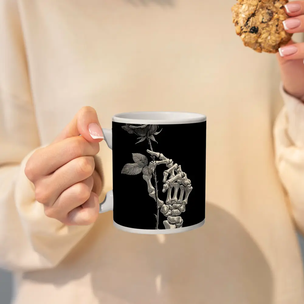 Skeleton Hand Holding Rose Black Background – Mugs