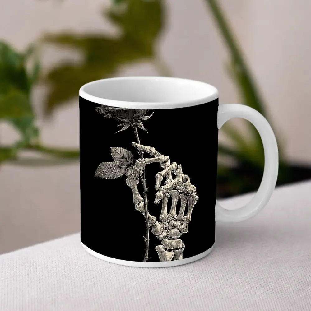 Skeleton Hand Holding Rose Black Background – Mugs