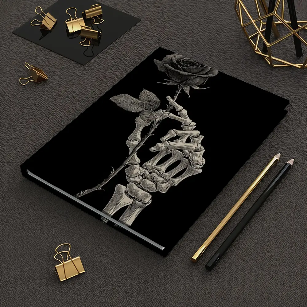 Skeleton Hand Holding Rose Black Background – Notebooks