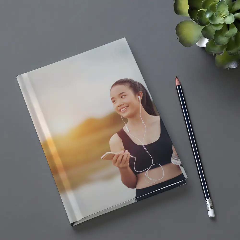 Fit Woman Running Outdoors at Sunset – Notebooks