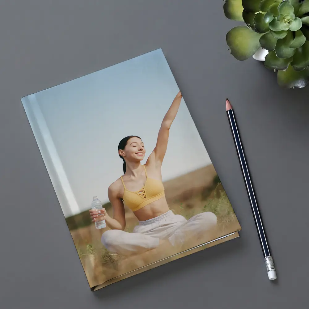 Woman Practicing Yoga Outdoors Sunny Field – Notebooks