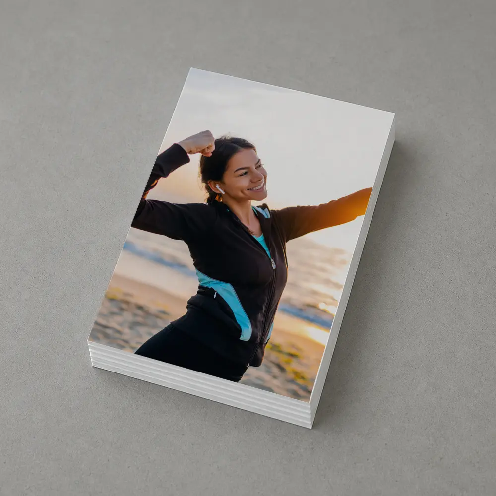 Woman Celebrating Victory at Sunrise Beach – Postcards