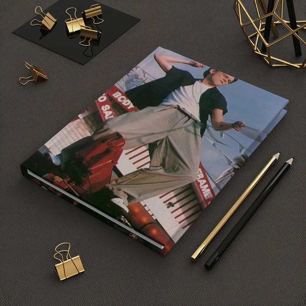 Young Man Posing Outdoors Auto Shop Background – Notebooks