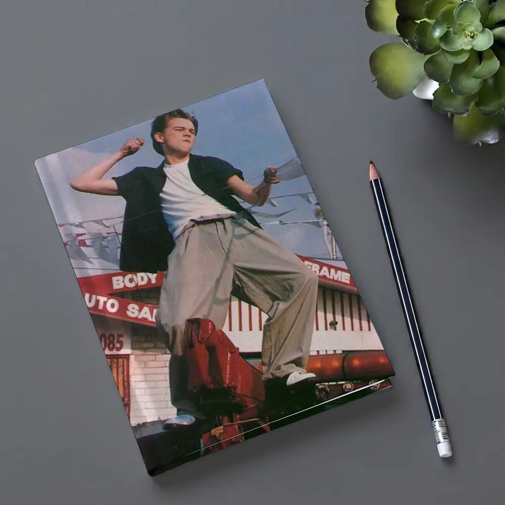Young Man Posing Outdoors Auto Shop Background – Notebooks