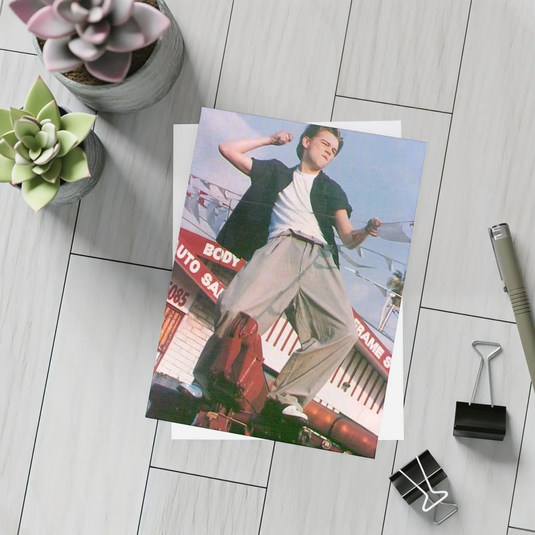 Young Man Posing Outdoors Auto Shop Background – Postcards