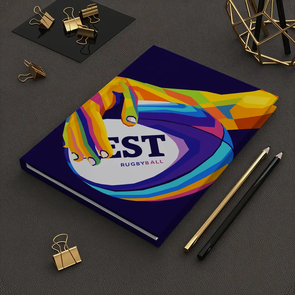 Rainbow Hand Gripping Rugby Ball Dark Background – Notebooks