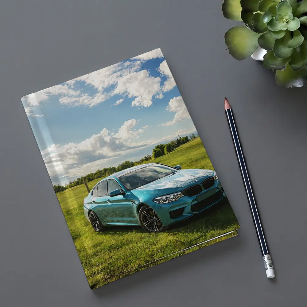 BMW M5 Sedan Parked On Green Field – Notebooks