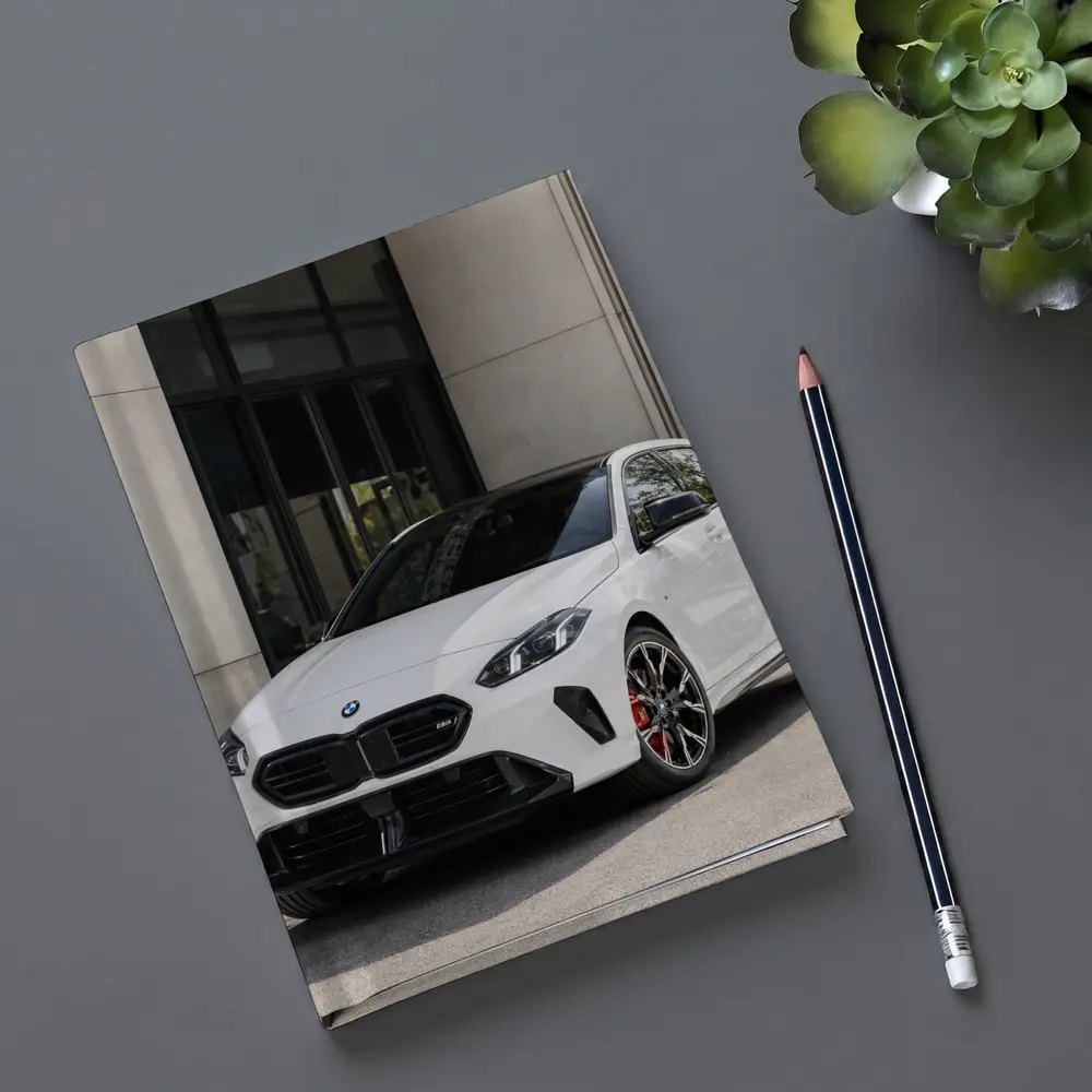 BMW M135 White Hatchback Urban Setting – Notebooks