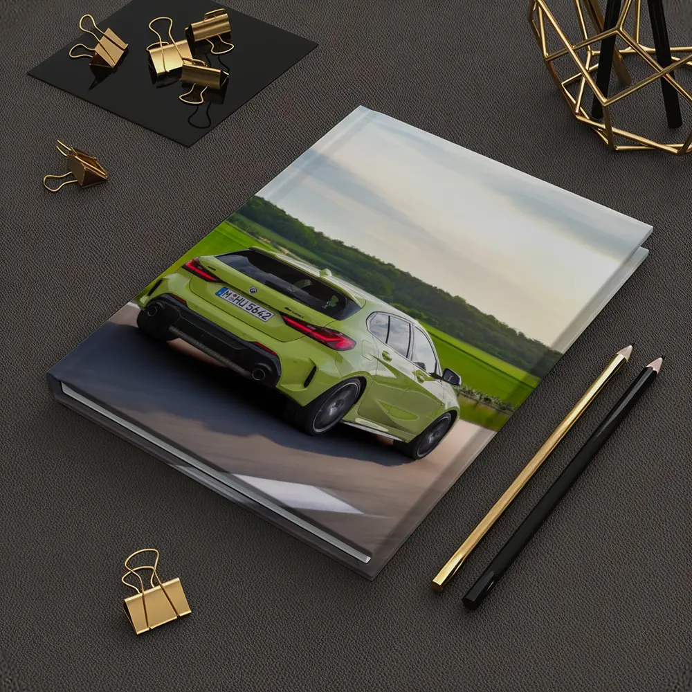 BMW M135i Green Hatchback On Open Road – Notebooks