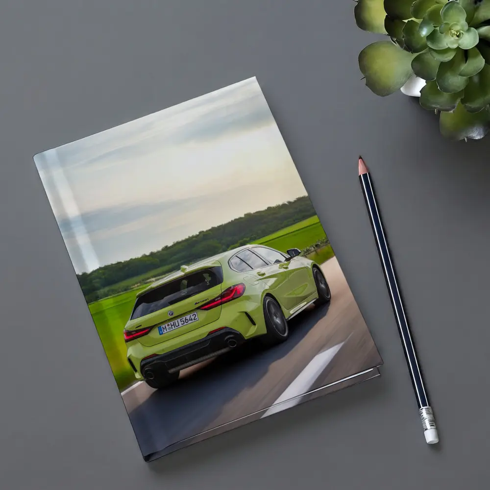 BMW M135i Green Hatchback On Open Road – Notebooks