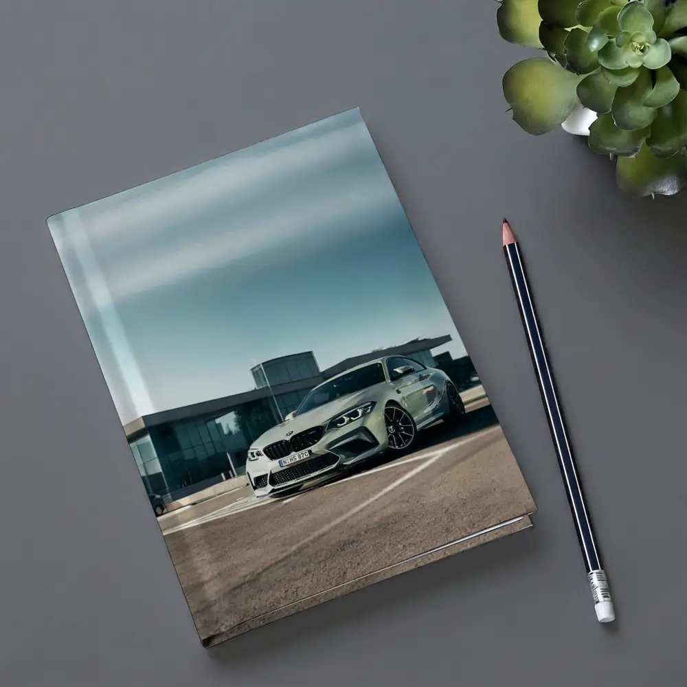 BMW M2 Competition Silver Parked Outside Building – Notebooks
