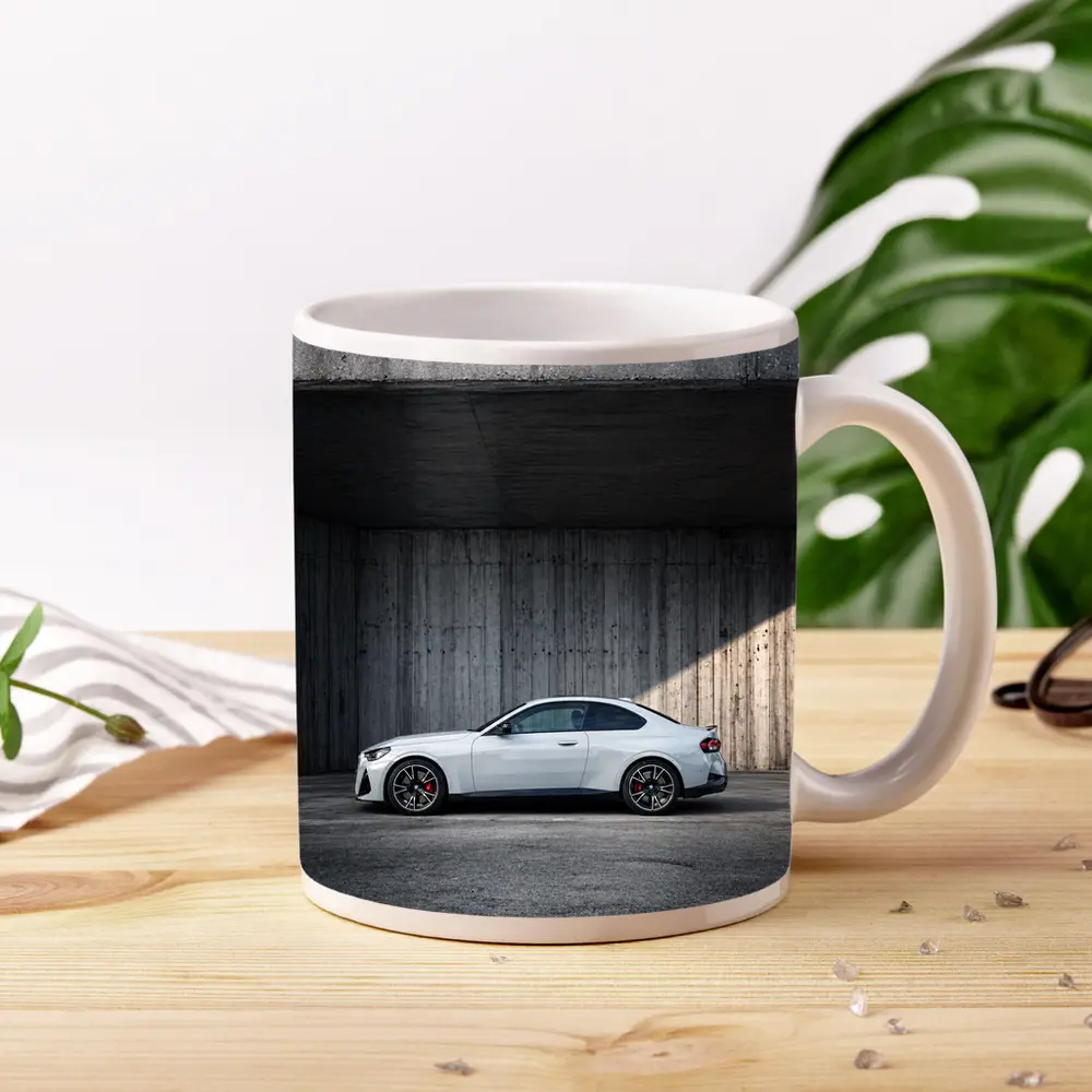 BMW M2 Coupe Parked Against Concrete Wall – Mugs
