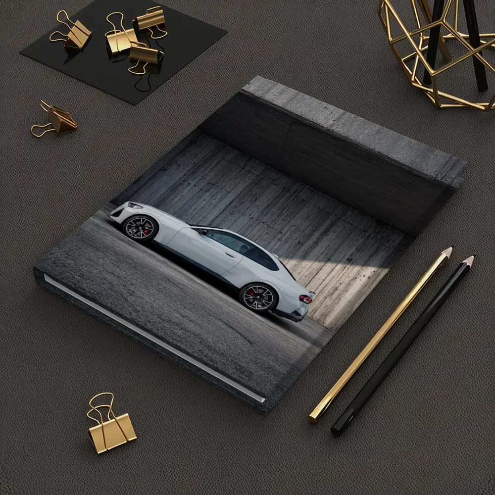 BMW M2 Coupe Parked Against Concrete Wall – Notebooks