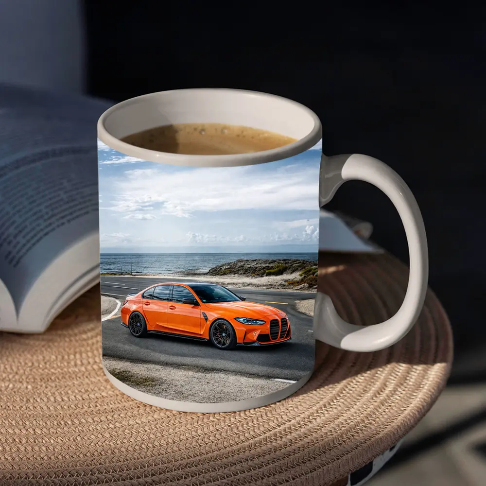 BMW M3 Orange Sedan Coastal Road Shot – Mugs