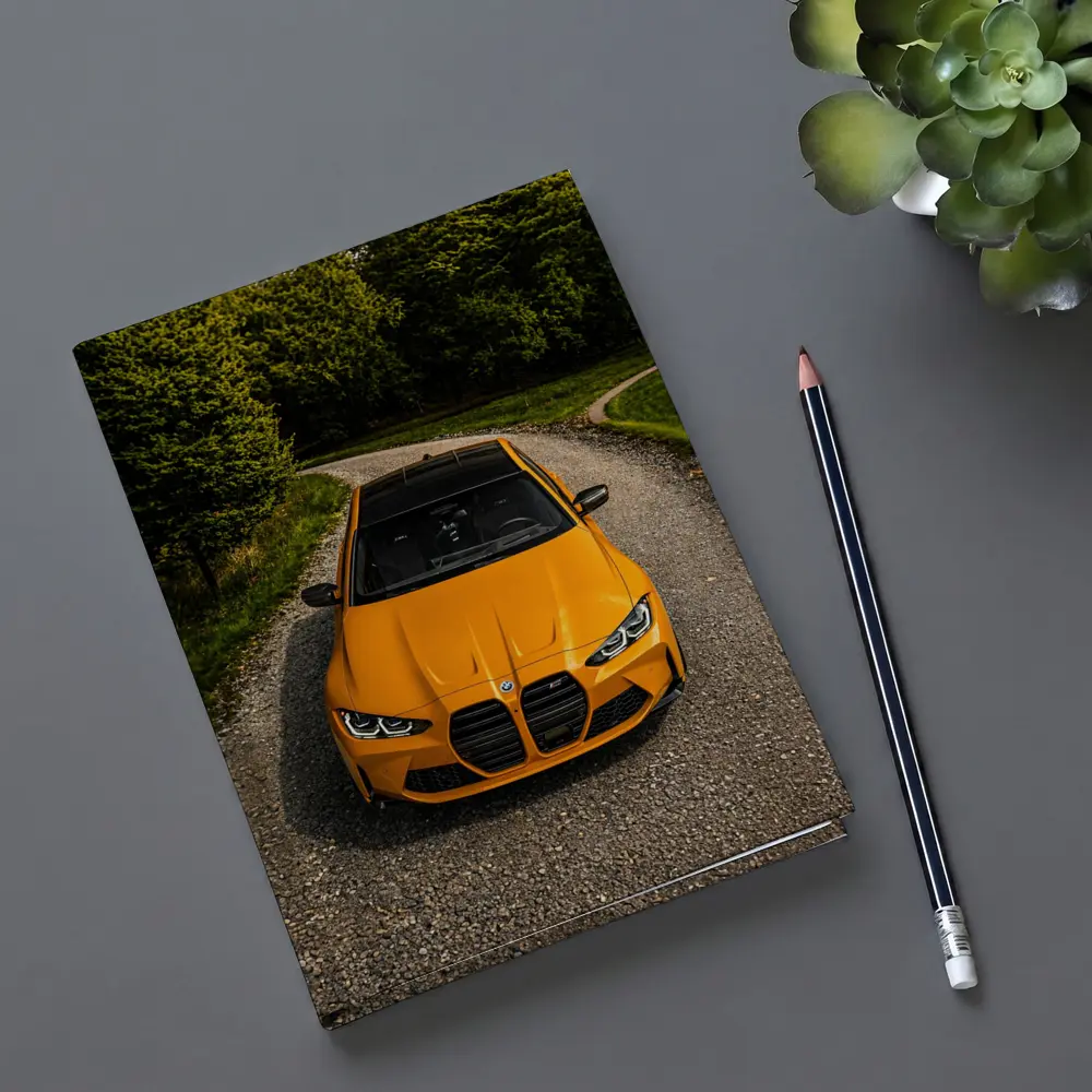 BMW M4 Orange Front View Gravel Road – Notebooks