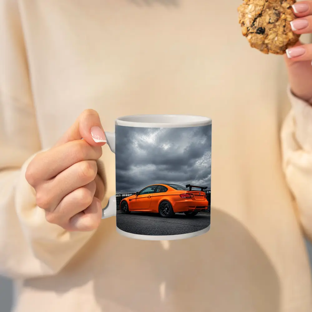 BMW M3 GTS Orange Under Stormy Sky – Mugs