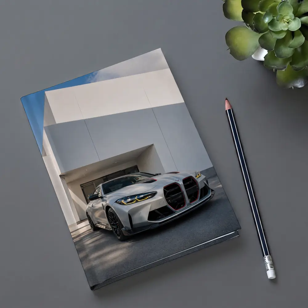 BMW M4 CSL Silver Against White Architecture – Notebooks