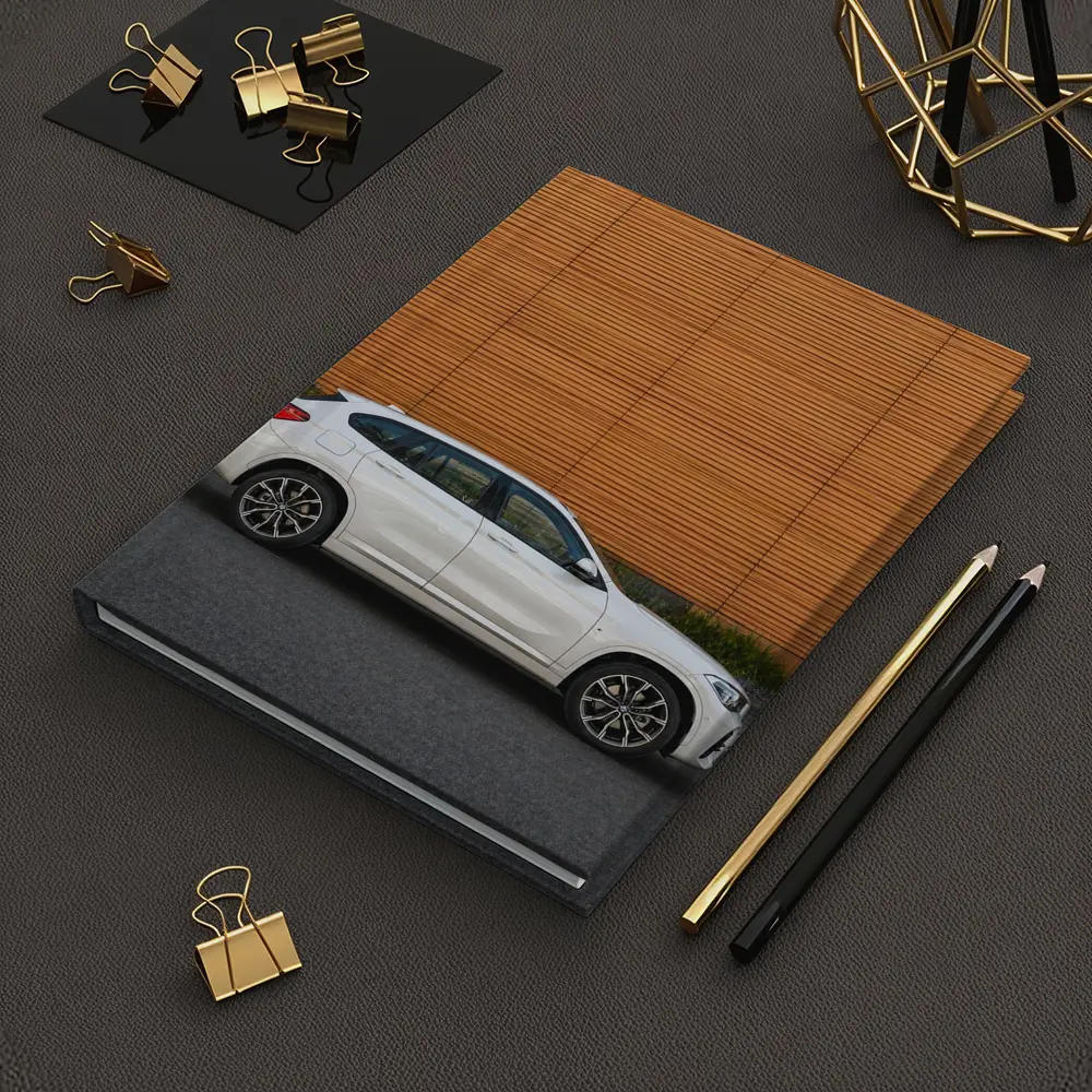 BMW X1 White SUV Orange Wall Background – Notebooks