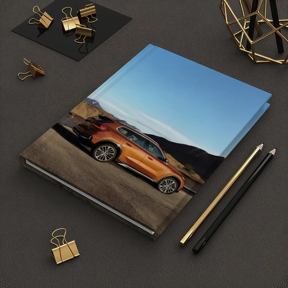 BMW X1 Orange SUV Desert Mountain Backdrop – Notebooks