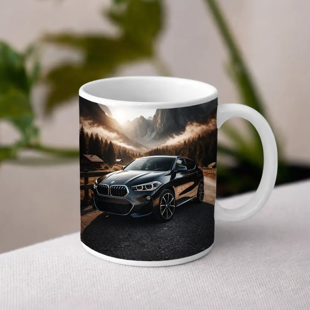 BMW X2 Parked Against Misty Mountain Backdrop – Mugs