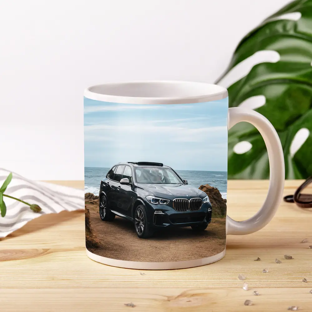 BMW X3 Parked on Coastal Cliff Trail – Mugs