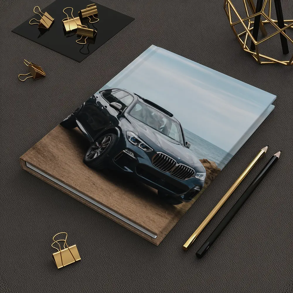 BMW X3 Parked on Coastal Cliff Trail – Notebooks