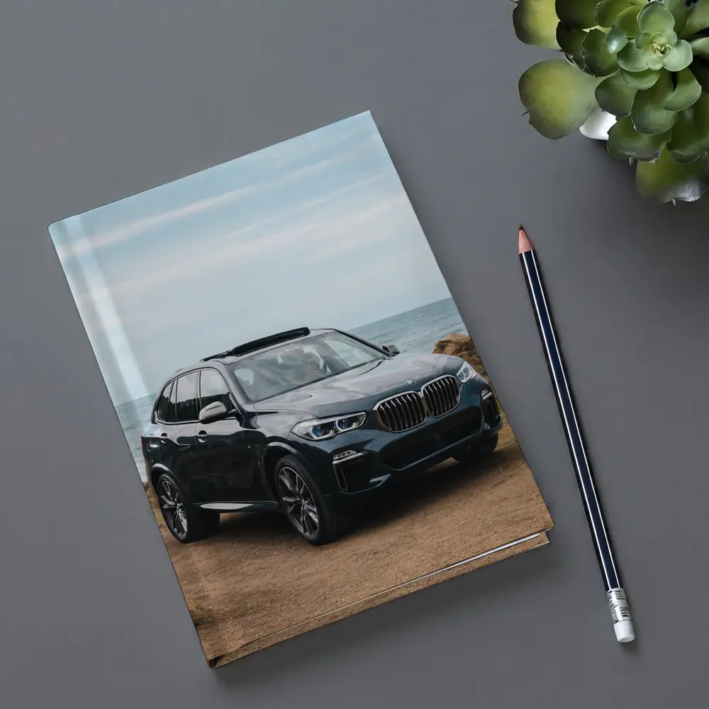 BMW X3 Parked on Coastal Cliff Trail – Notebooks
