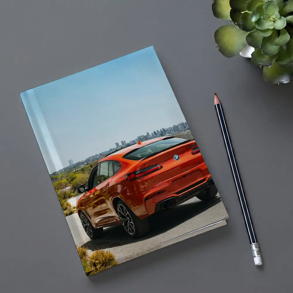 BMW X4 M Orange Rear City Skyline – Notebooks