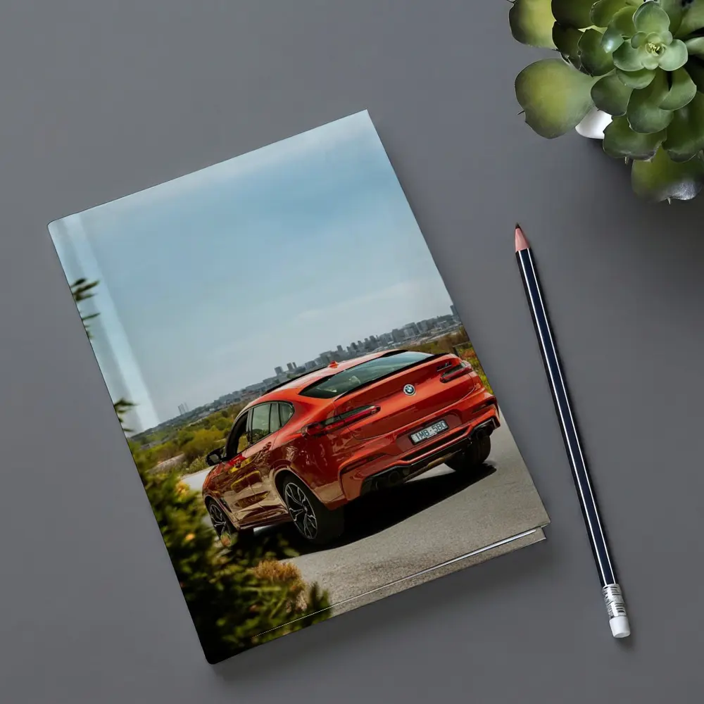 BMW X4 M Competition Orange City Backdrop – Notebooks