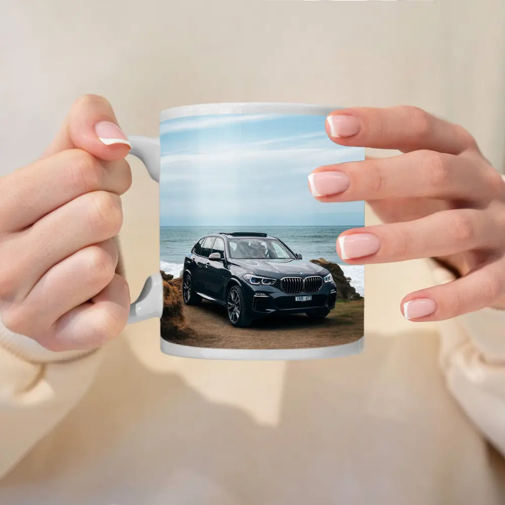BMW X5 Parked by Coastal Rocky Shore – Mugs