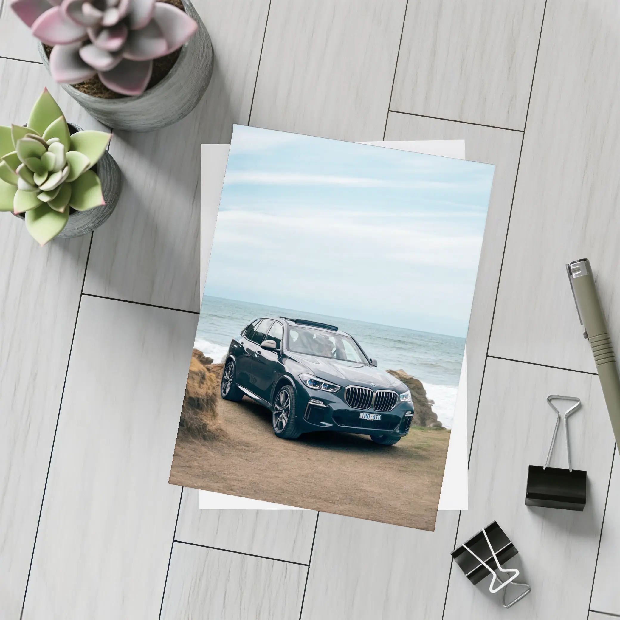 BMW X5 Parked by Coastal Rocky Shore – Postcards