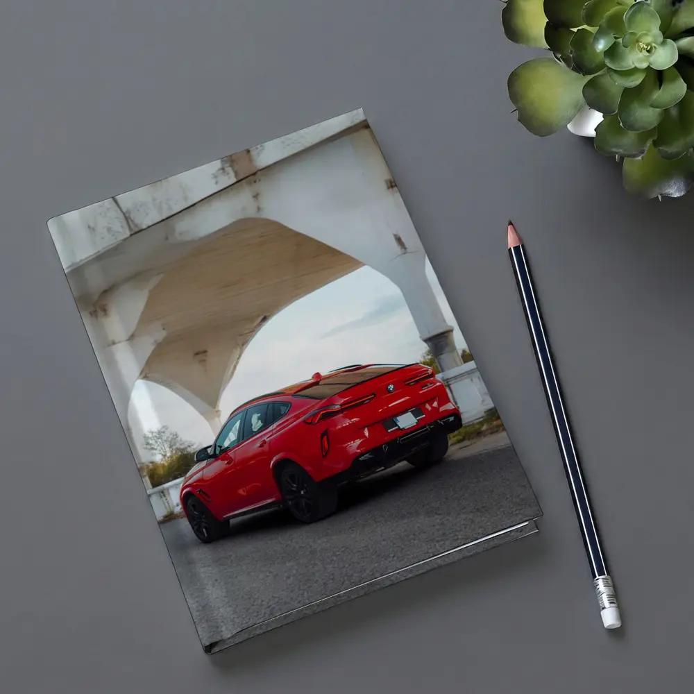 BMW X6 Red Under Concrete Bridge – Notebooks