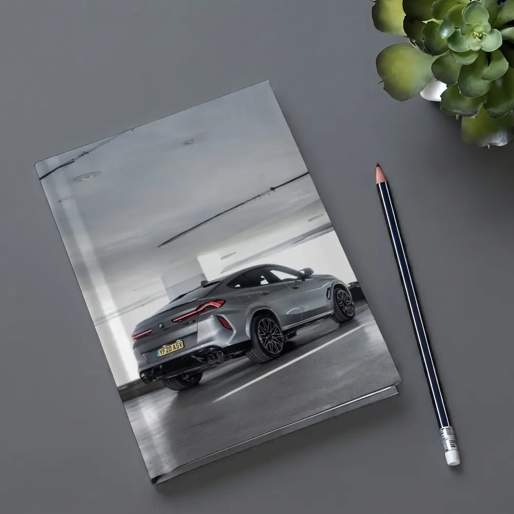BMW X6M Gray Parked In Parking Garage – Notebooks