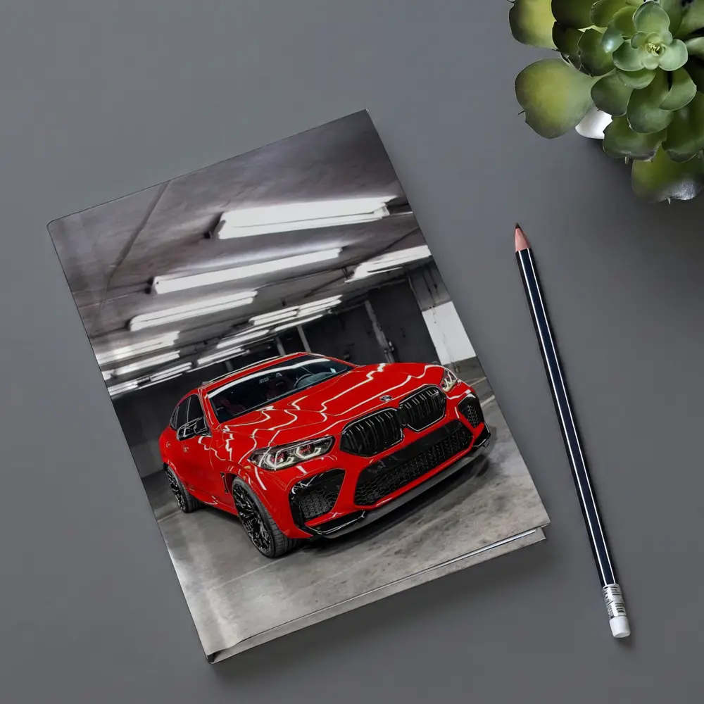 Red BMW X6 M Parked Indoor Garage – Notebooks