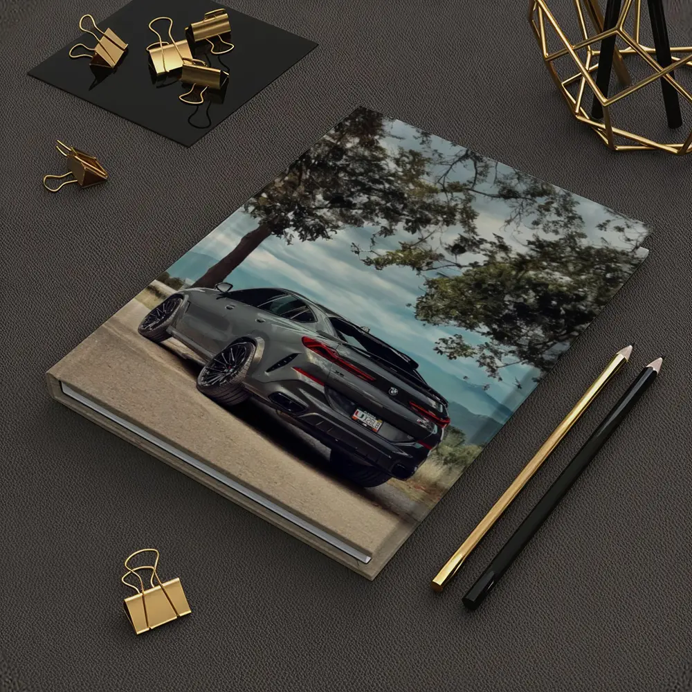BMW X6M Matte Gray Mountain Road Scene – Notebooks