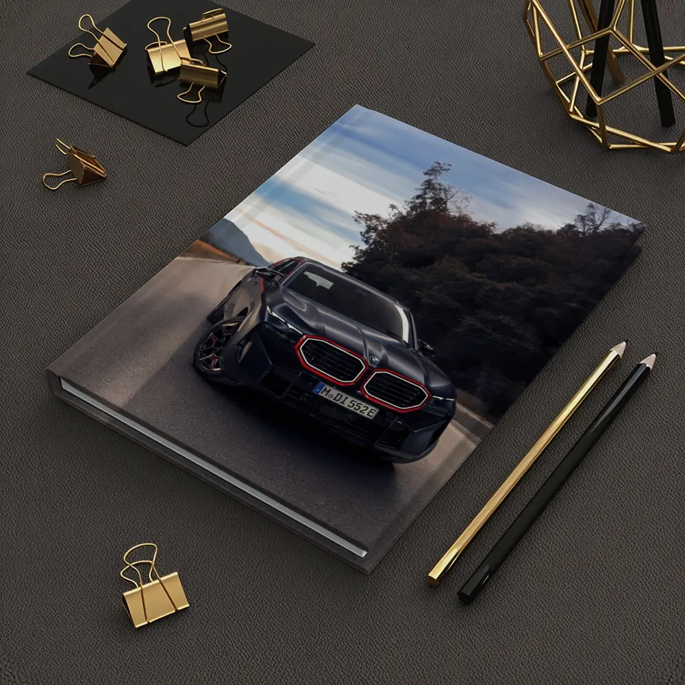 BMW XM Label Red on Open Road – Notebooks