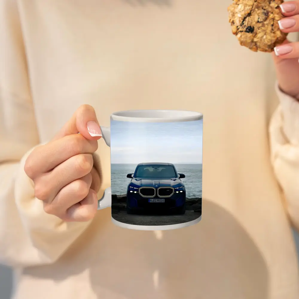 BMW XM Front View Ocean Background – Mugs
