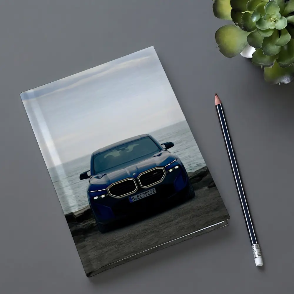 BMW XM Front View Ocean Background – Notebooks
