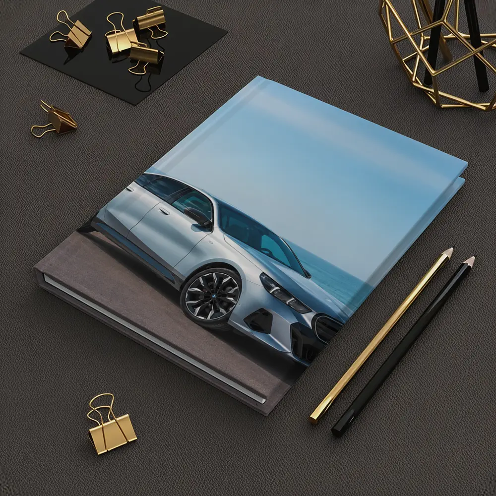 BMW i5 Silver Sedan By The Ocean – Notebooks