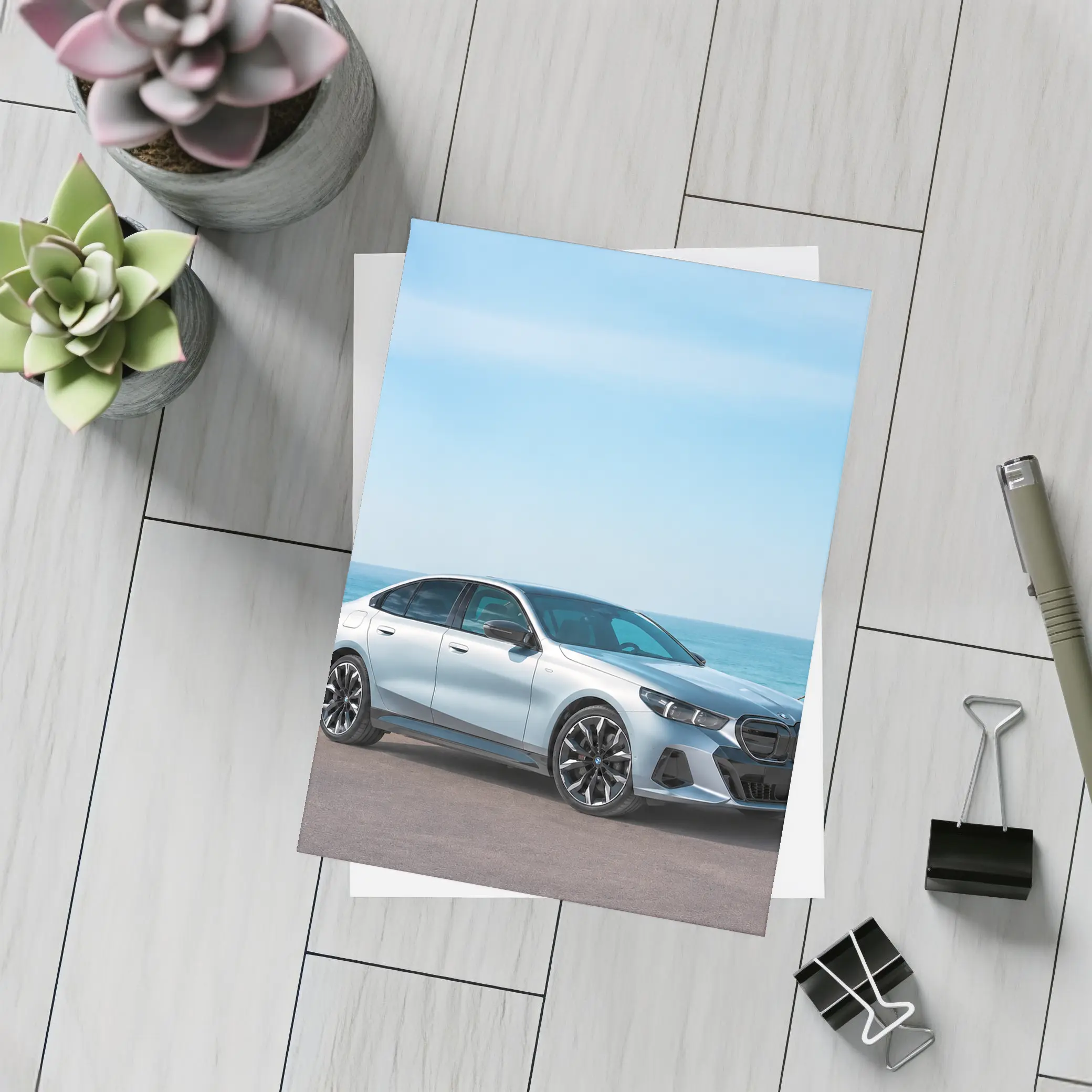 BMW i5 Silver Sedan By The Ocean – Postcards