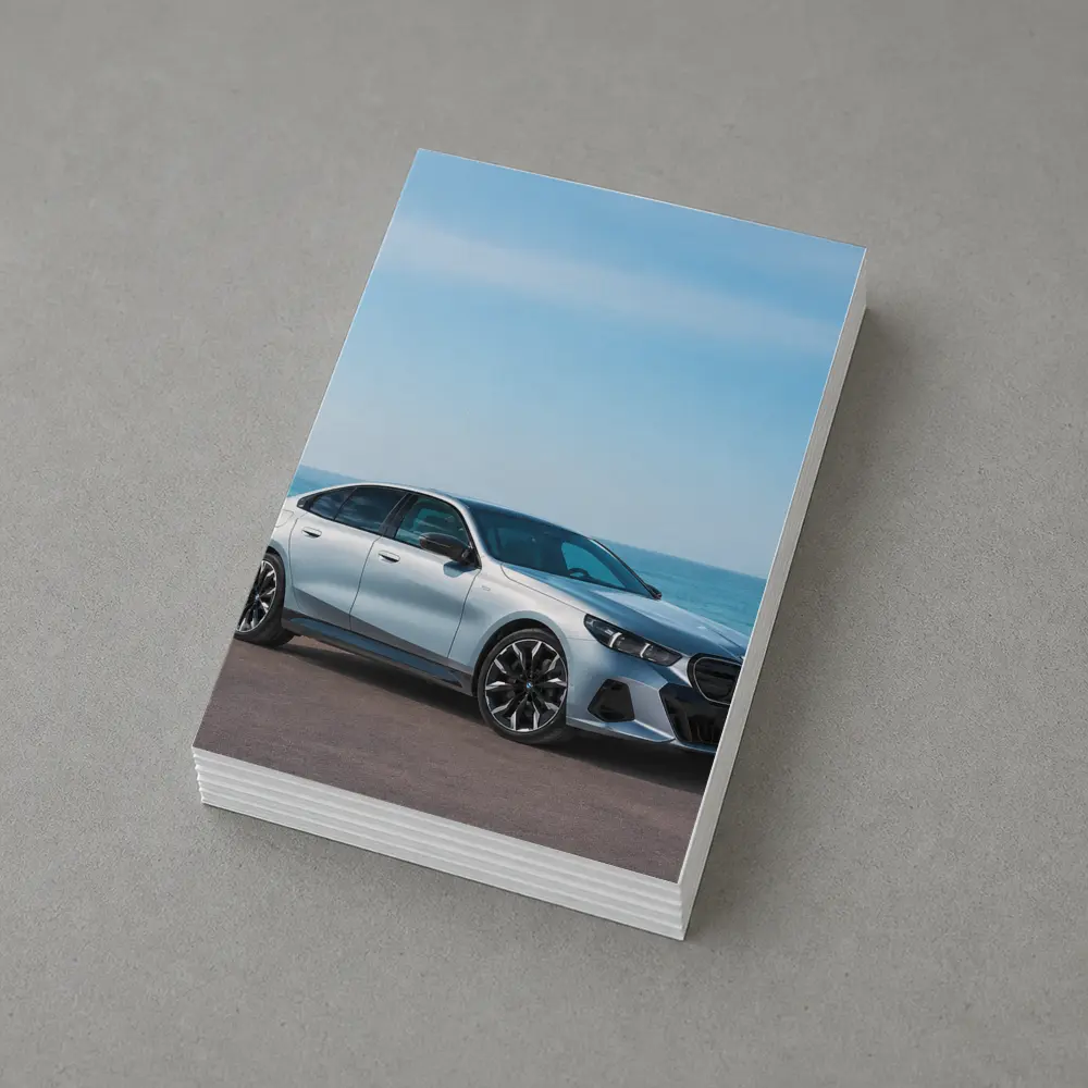 BMW i5 Silver Sedan By The Ocean – Postcards
