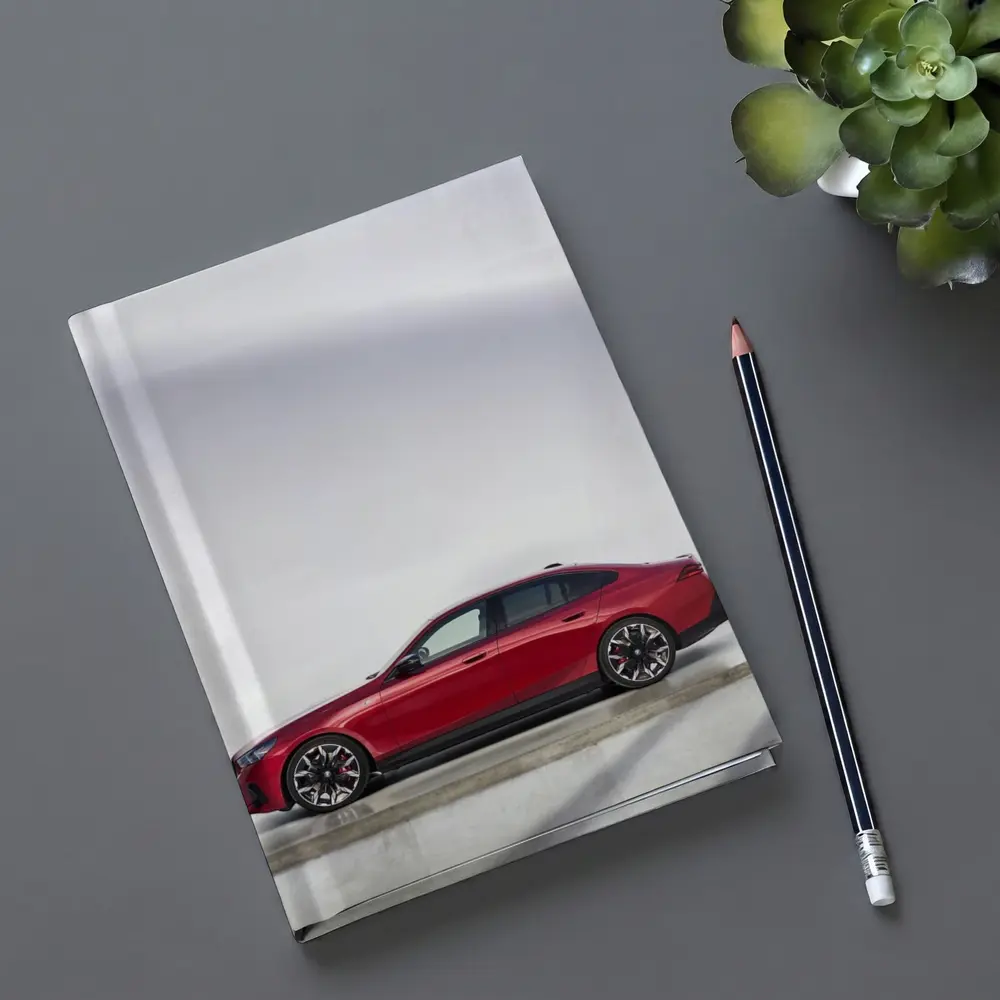 BMW i5 M60 Red Sedan Studio Shot – Notebooks