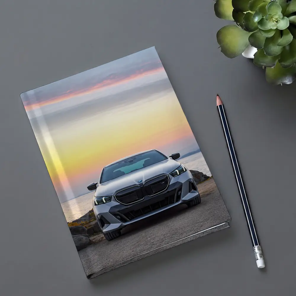 BMW i5 M60 Sedan Coastal Sunset View – Notebooks