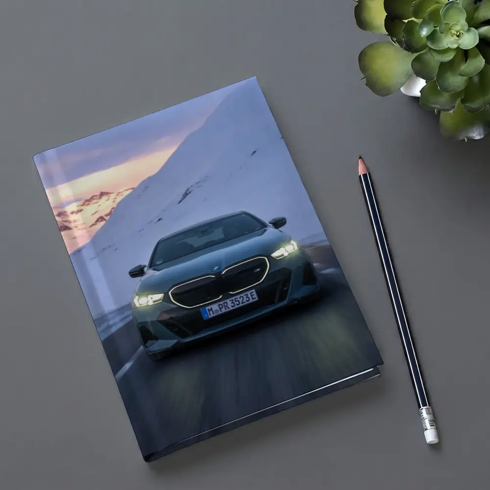 BMW i5 M60 Sedan Snowy Mountain Road – Notebooks